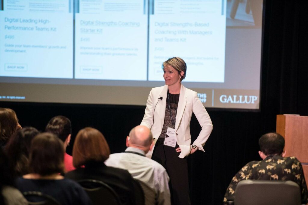 Maika Leibbrandt giving presentation at GALLUP